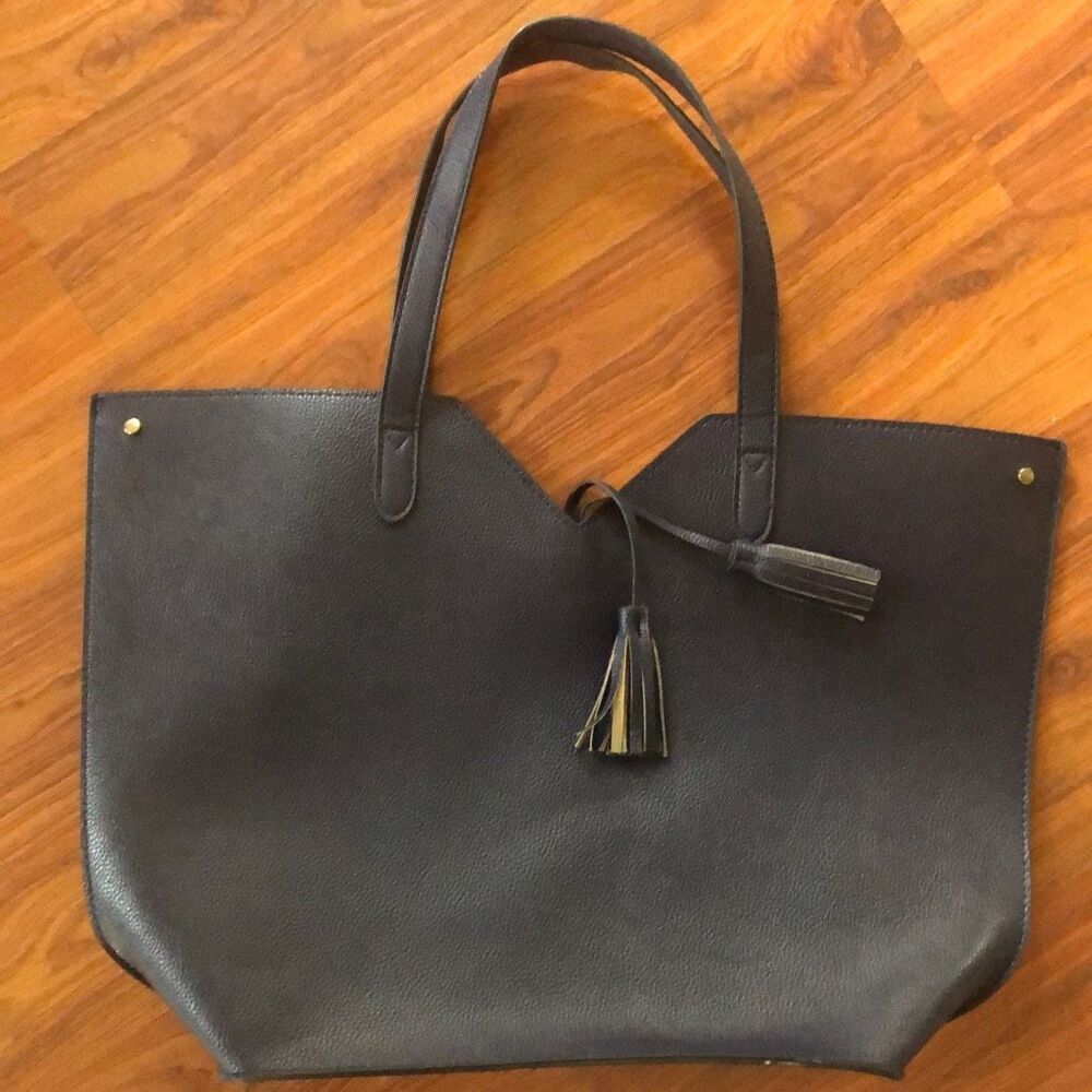 Neiman Marcus navy medium size tote with tassels